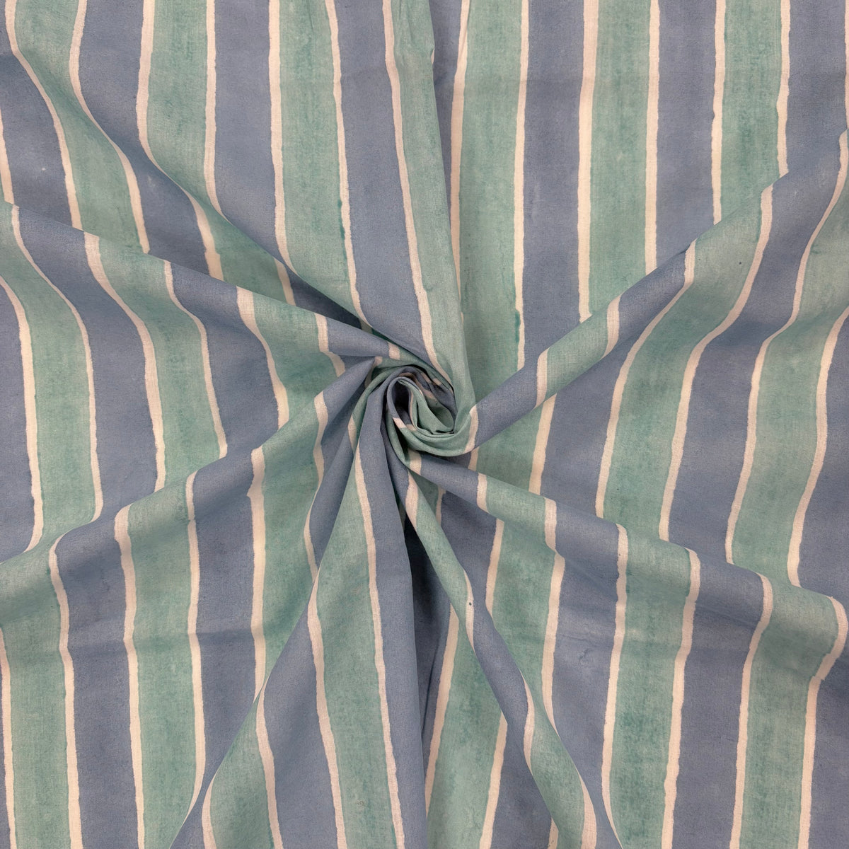 Blue Ocean Stripe Indian Print Cotton Fabric, gathered, lightweight soft cotton with a traditional handcrafted Indian tartan check pattern.