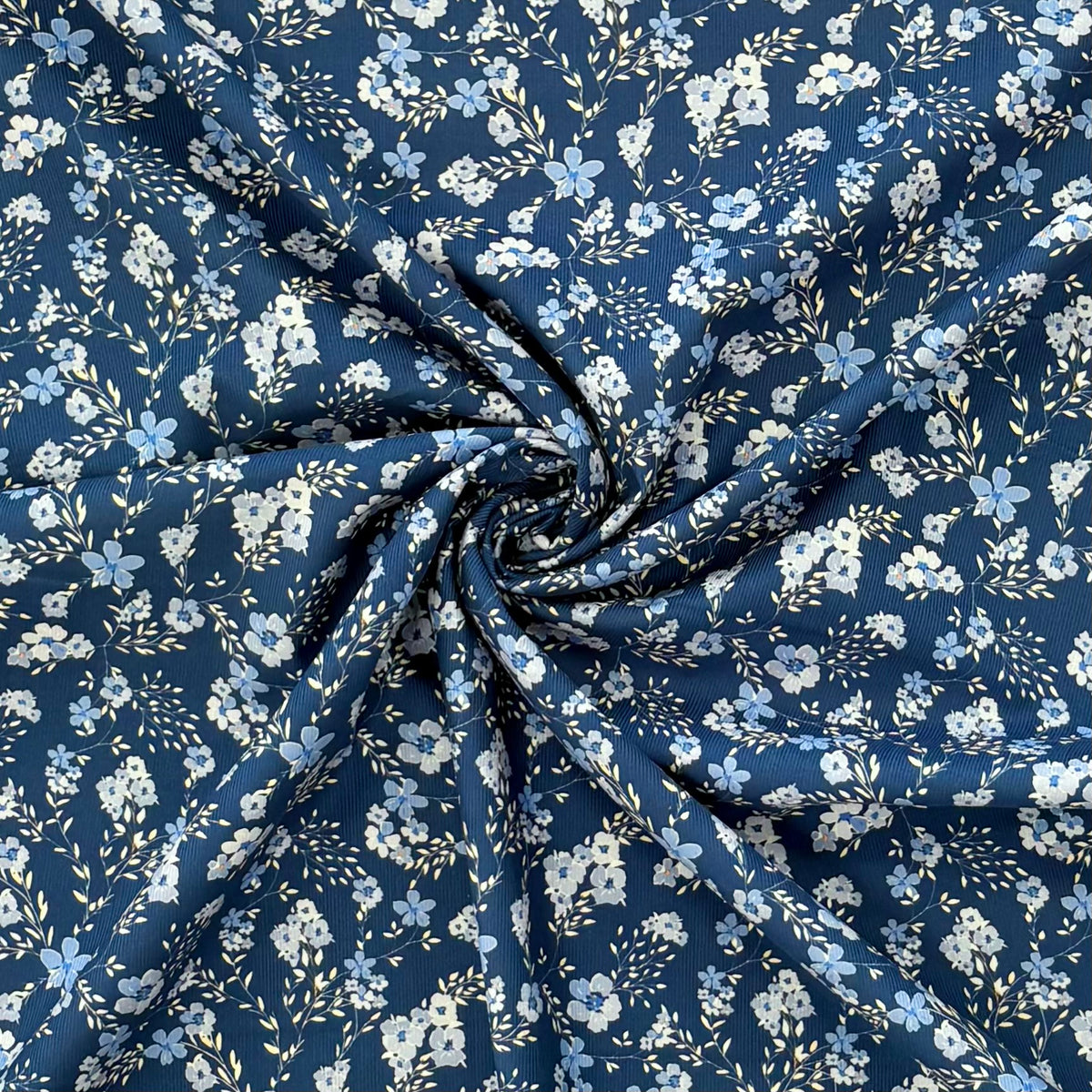 C858 Dainty Trailing Floral Needlecord Blue Fabric Gathered