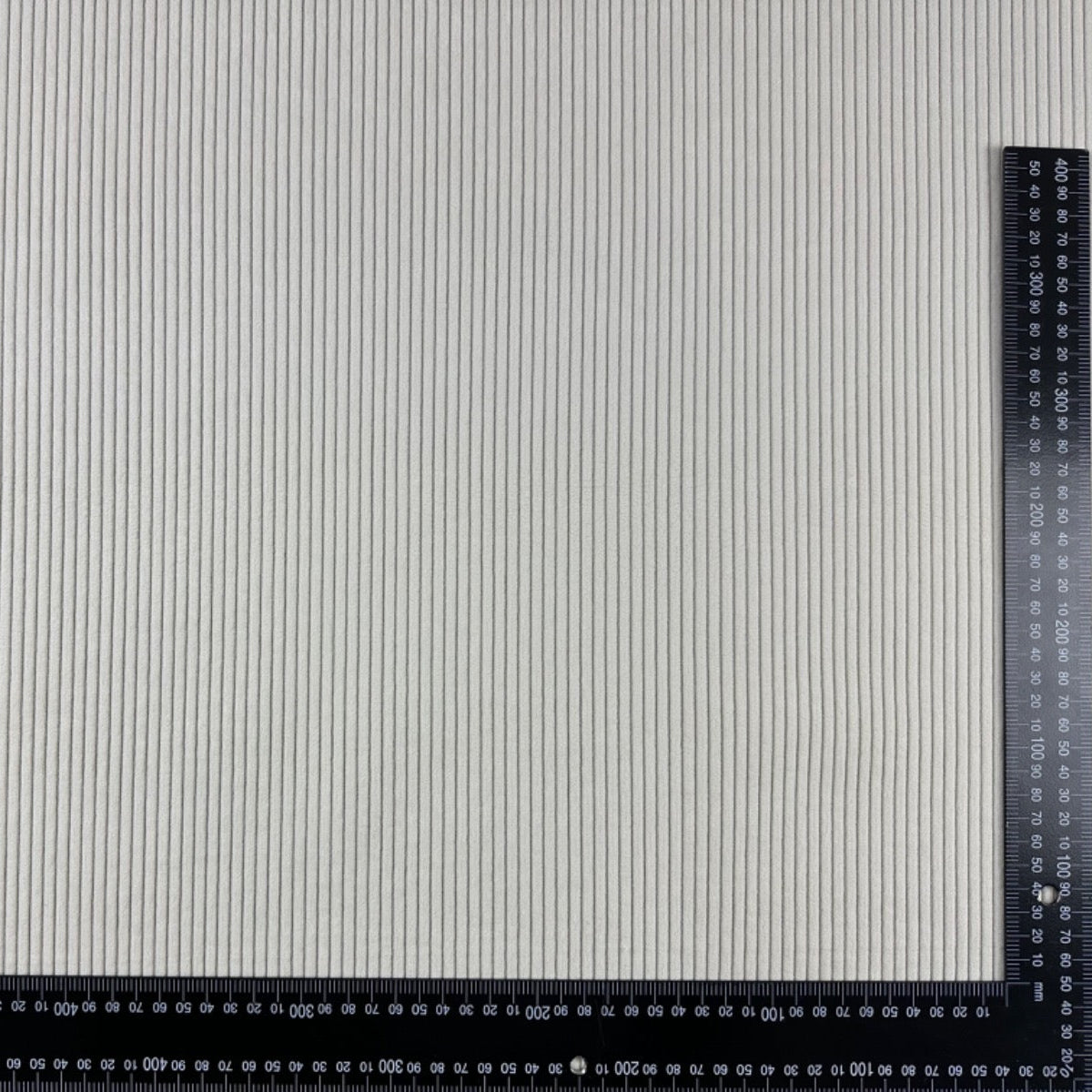 Chunky 5 Wale Upholstery Corduroy Ecru H337 with ruler for scale