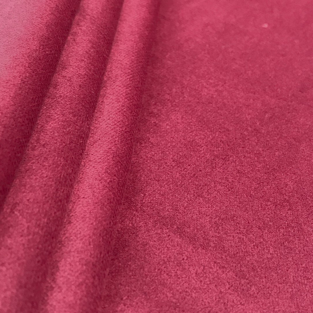 Close-up of a pink velvet fabric surface