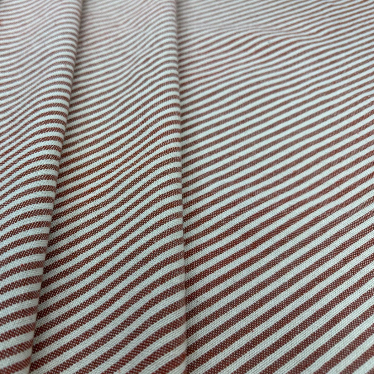 H362 Rustic Pierre Stripe Rust Fabric Folded