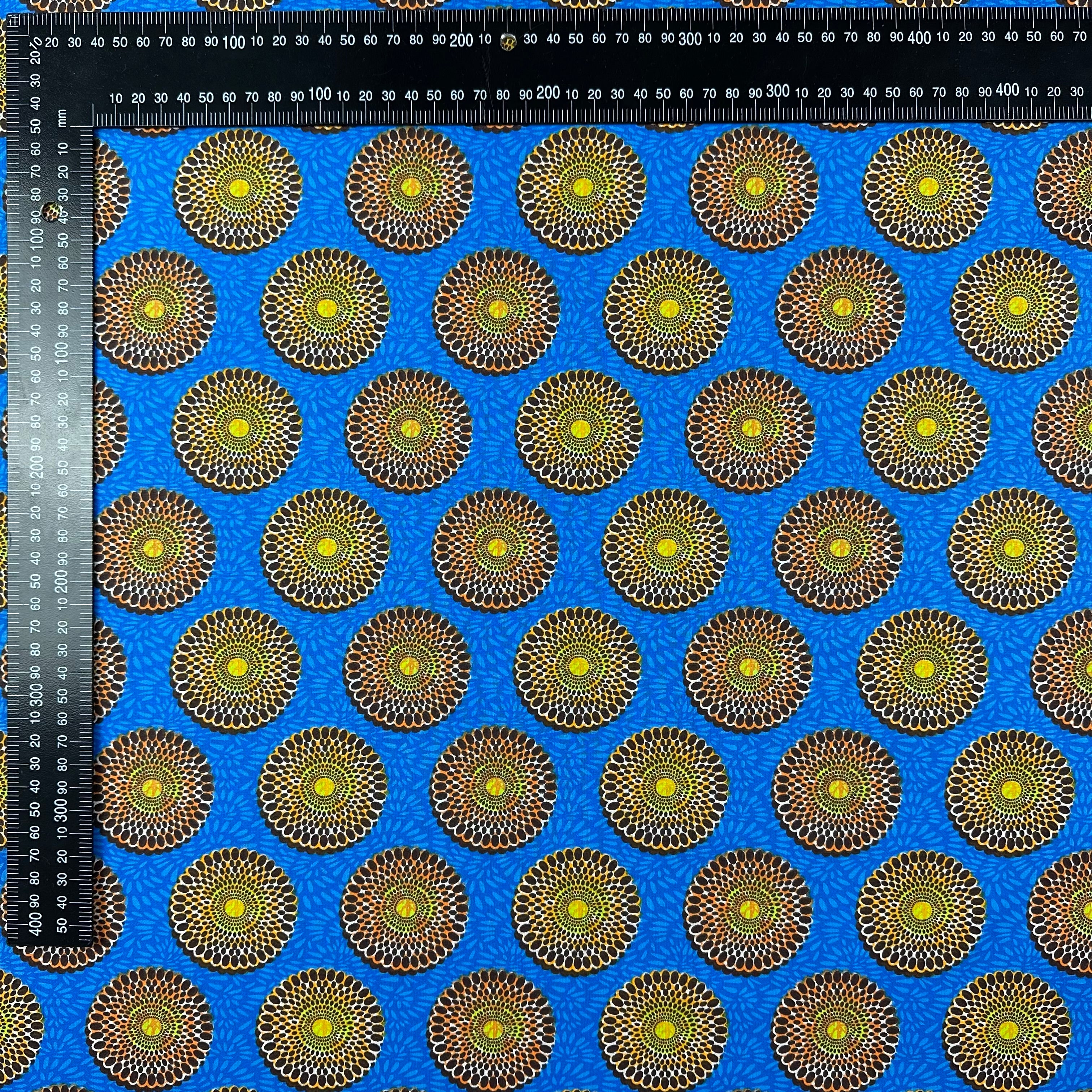 H426 Sunburst Cotton Blue Ruler for scale