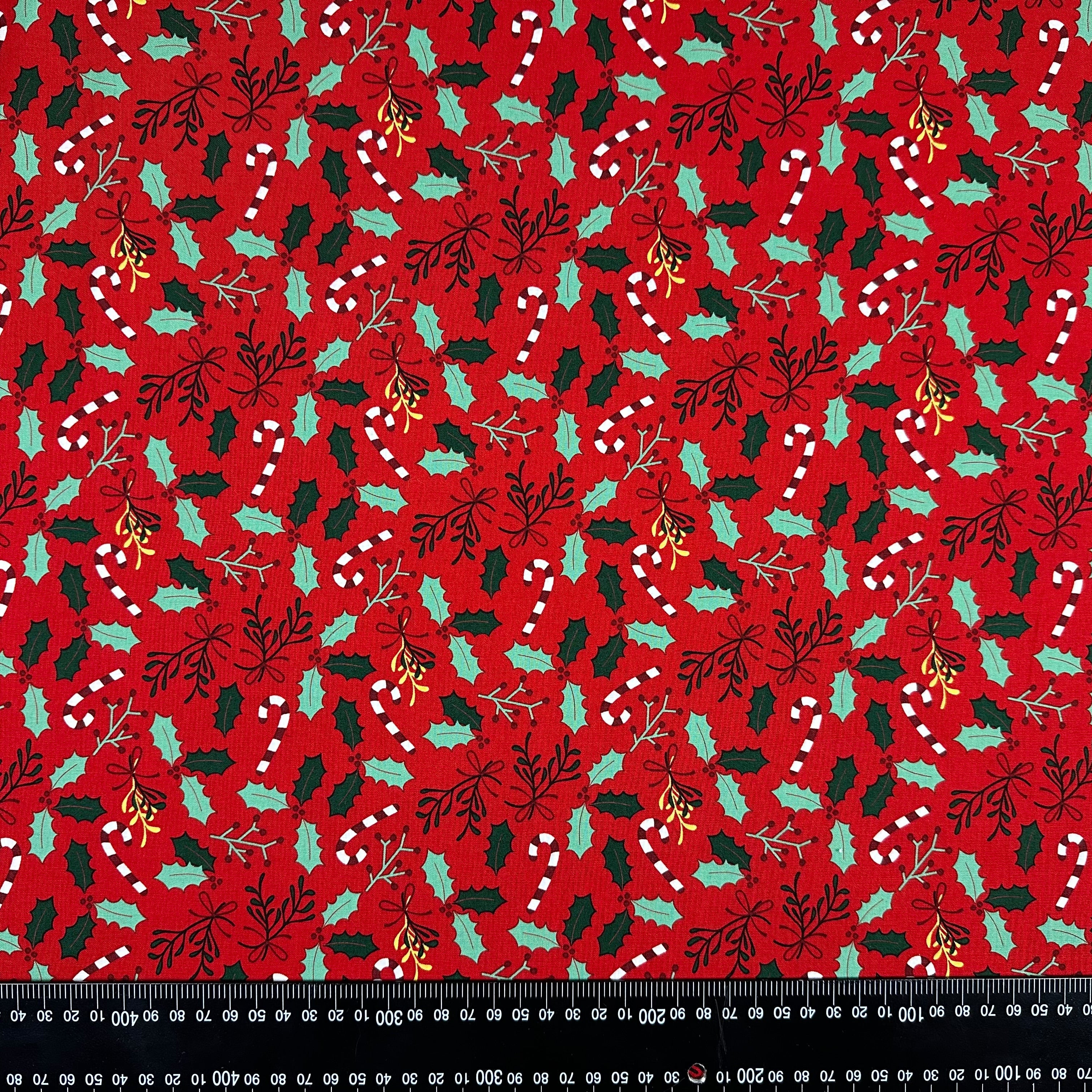 I526 Candy cane and holly fabric with scale