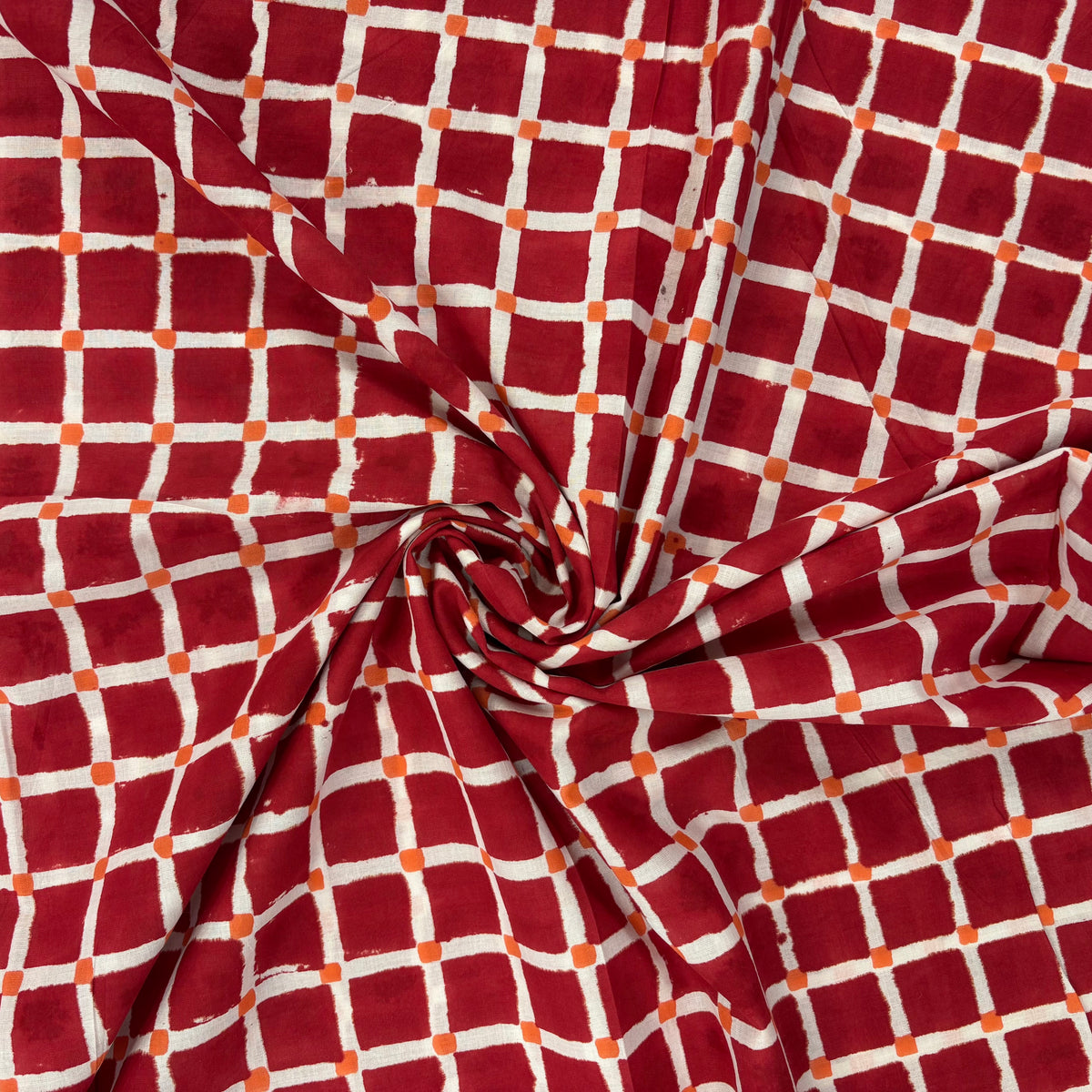 Squares Block Print Cotton Fabric, gathered, lightweight soft cotton with a traditional handcrafted Indian tartan check pattern.