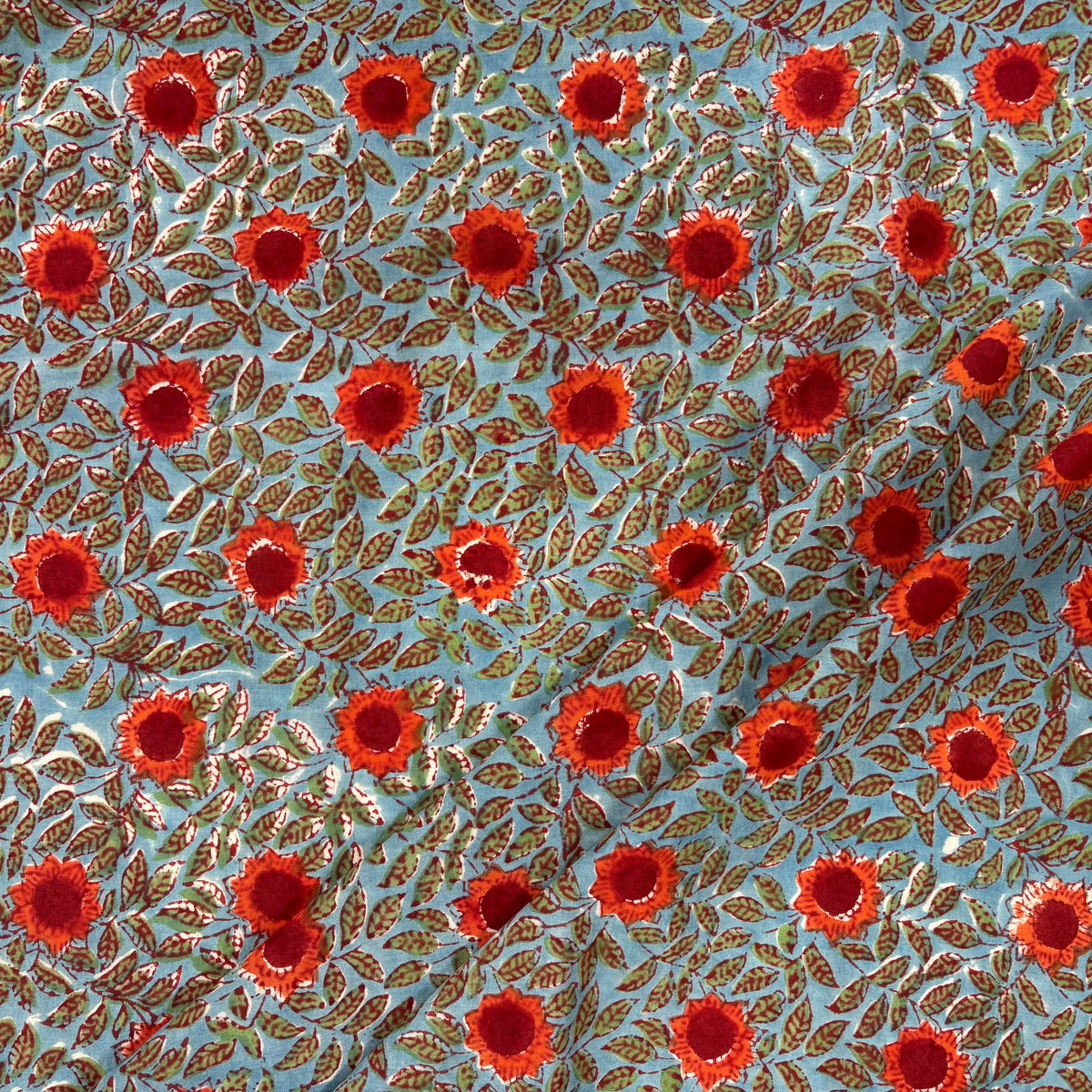 Sunflower Floral Block Print Cotton Fabric, folded, lightweight soft cotton with a traditional handcrafted Indian floral pattern