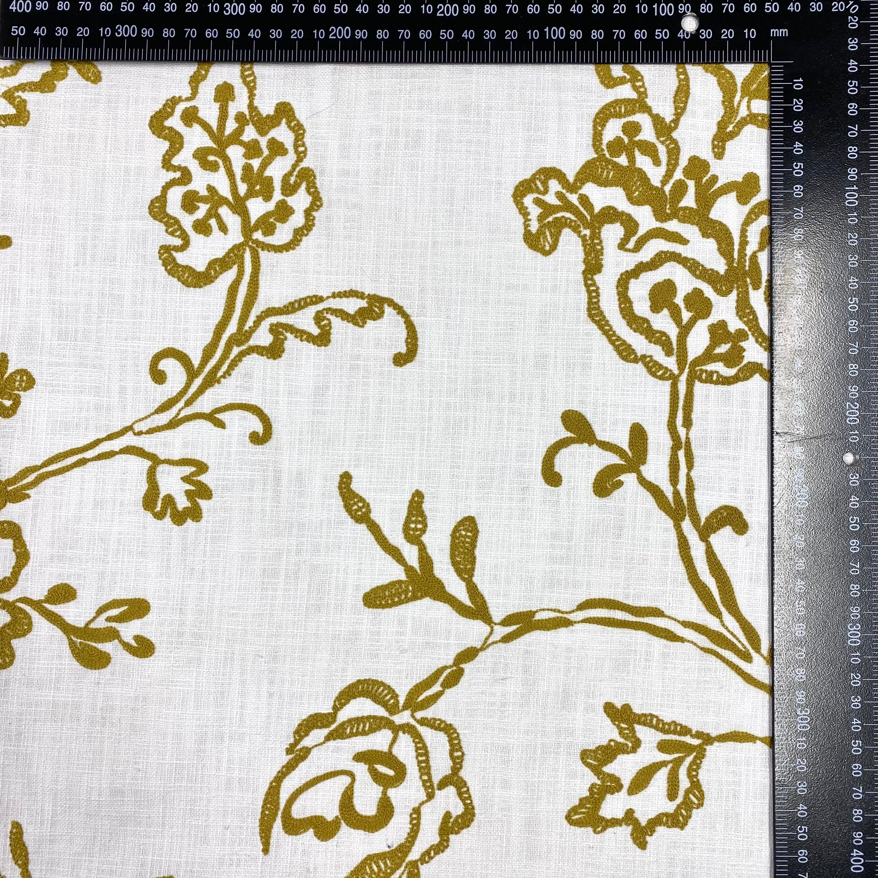 Tex Ex 2937 Embroidered Floral Linen Mustard With ruler for scale