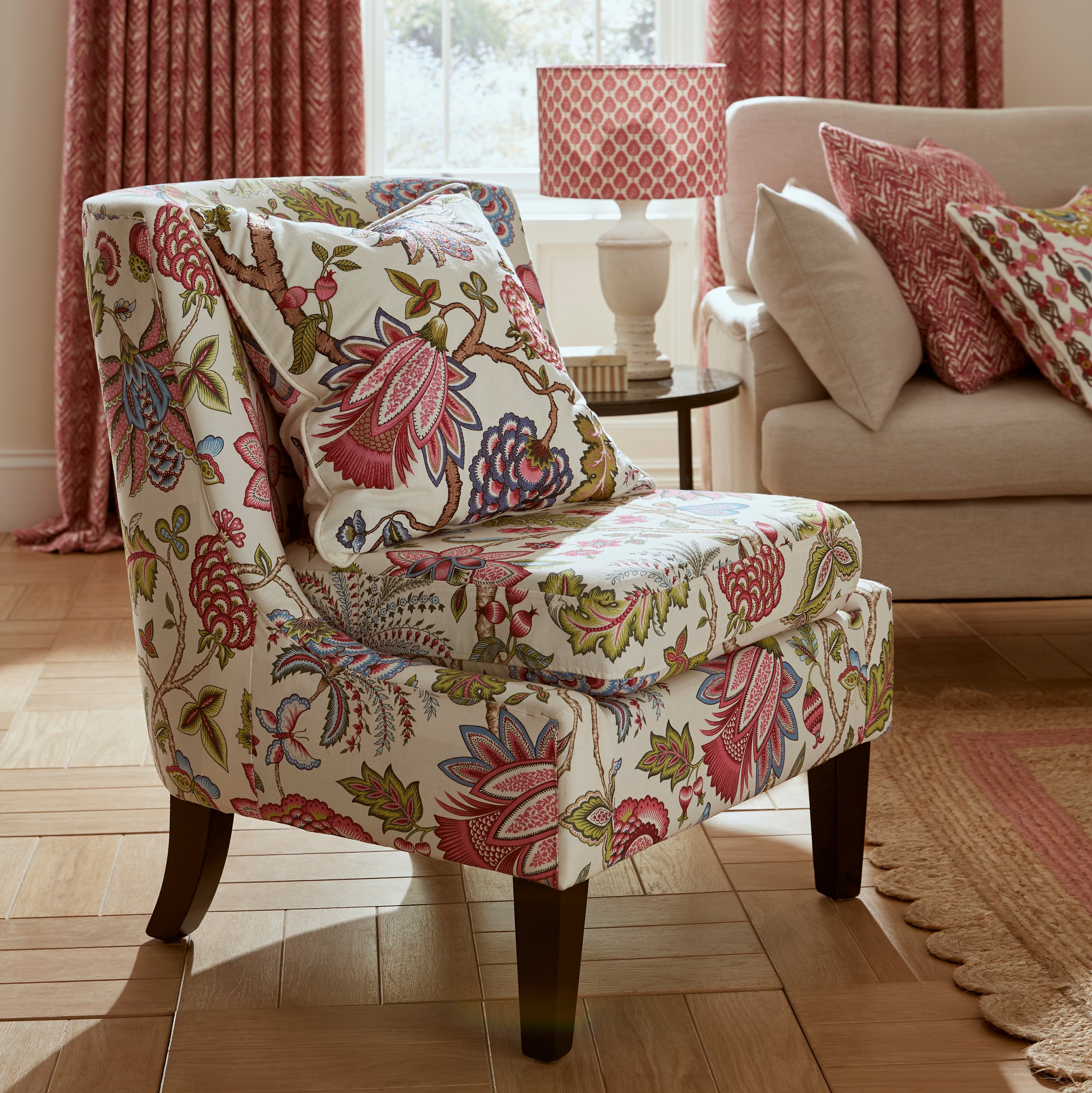 Decorative armchair with floral pattern in a living room setting