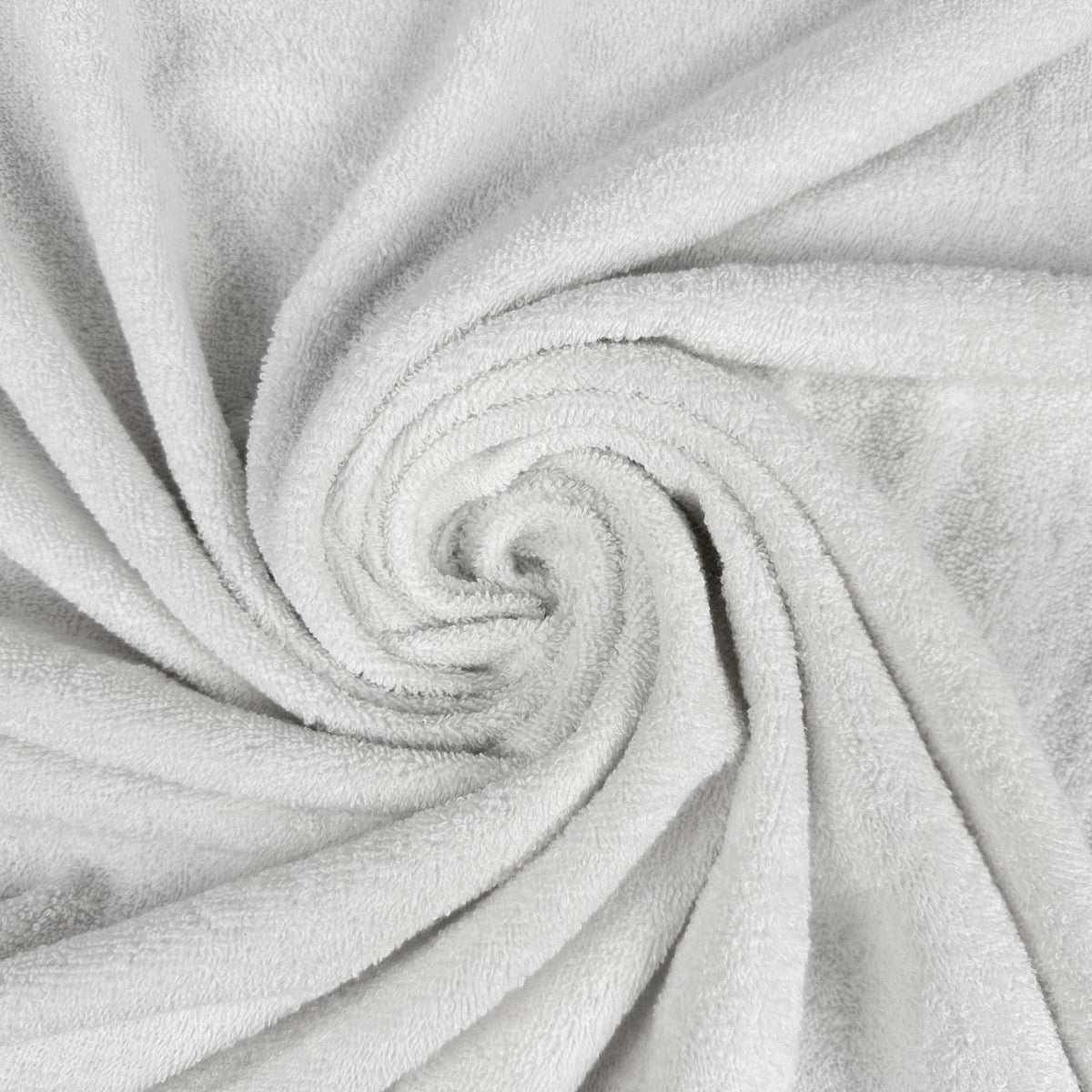 White cotton towelling fabric gathered