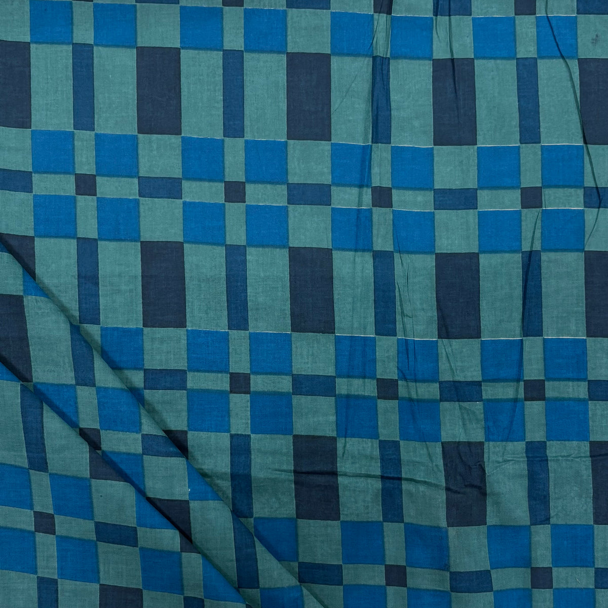 Blue blanket Check Indian Block Print Cotton Fabric folded, lightweight 100gsm printed cotton for dressmaking, handmade gifts, crafts and soft furnishings, handcrafted using traditional Indian printing techniques.