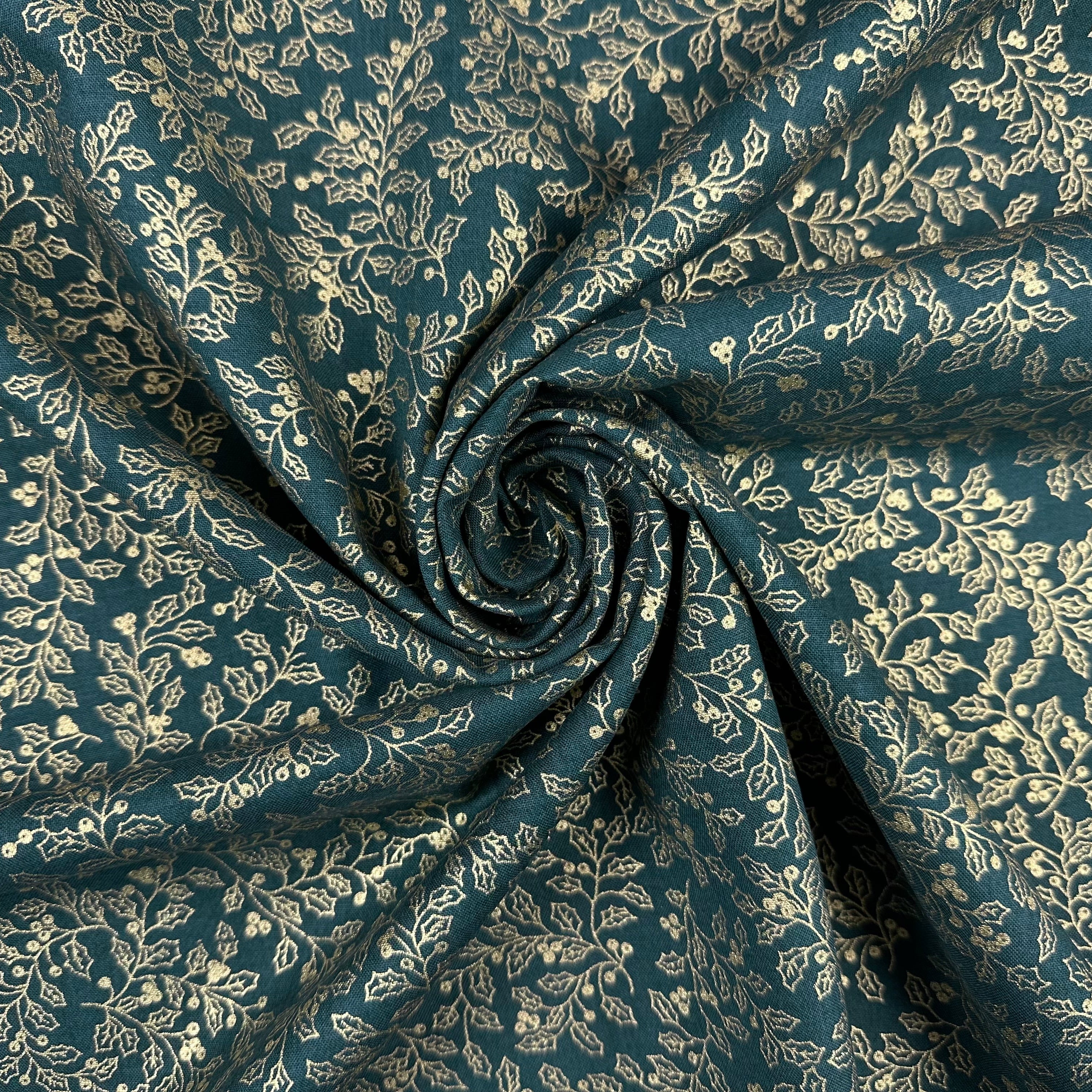 C830 Metallic Holly Outline Green  fabric gathered