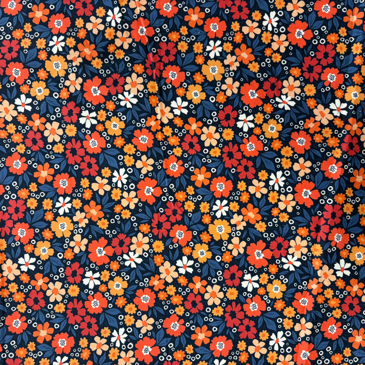 C859 Flower Power Needlecord Navy Coral Fabric Swatch