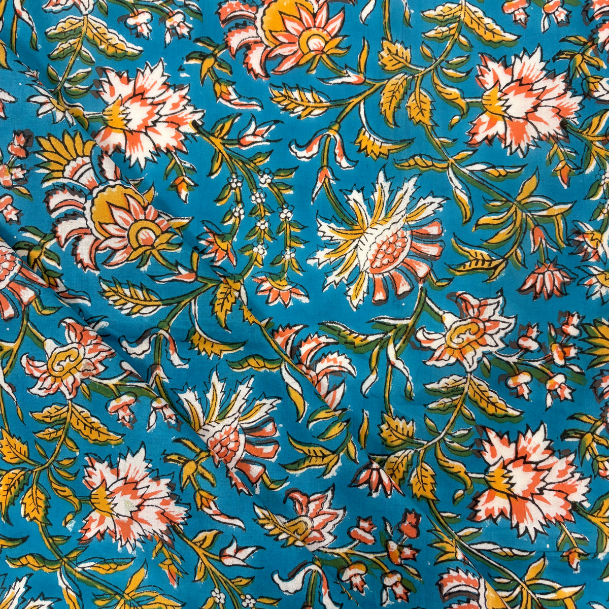 Celebration Floral Block Print Turquoise light weight cotton fabric Tex Ex 3045 folded