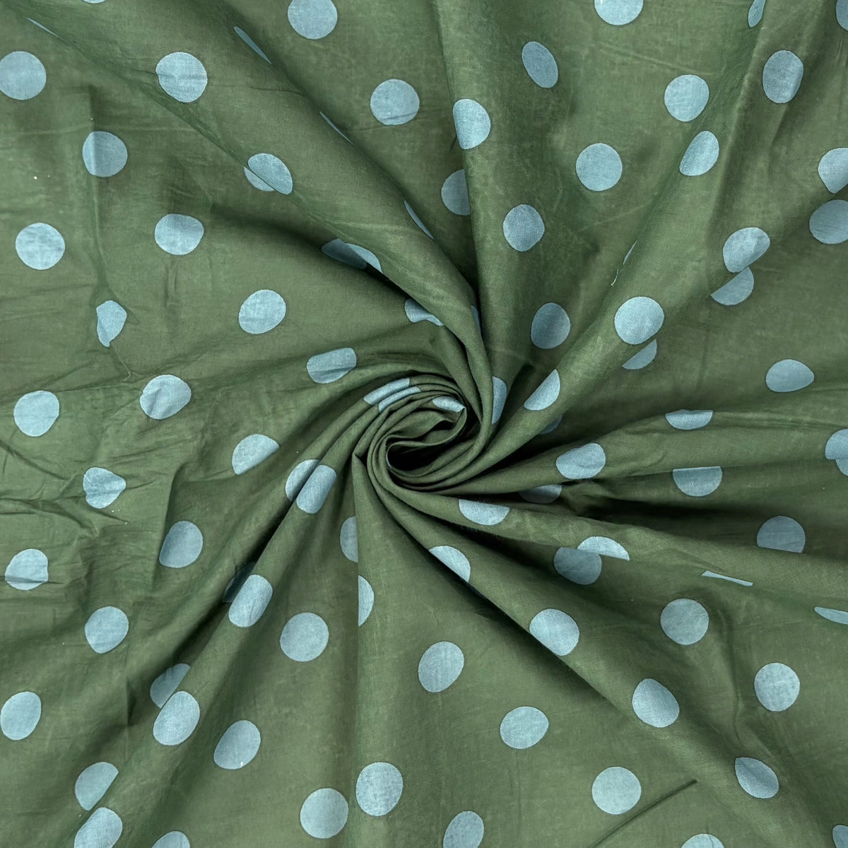 Forest Green Spotty Indian Print Cotton Fabric gathered, lightweight 100gsm printed cotton for dressmaking, handmade gifts, crafts and soft furnishings, handcrafted using traditional Indian printing techniques.
