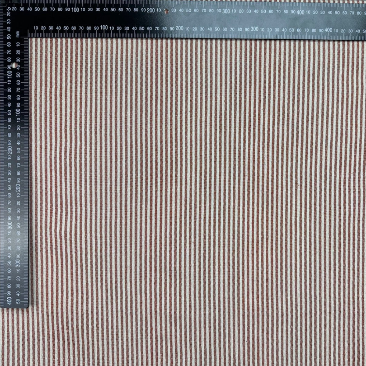 H362 Rustic Pierre Stripe Rust Fabric With Ruler For Scale