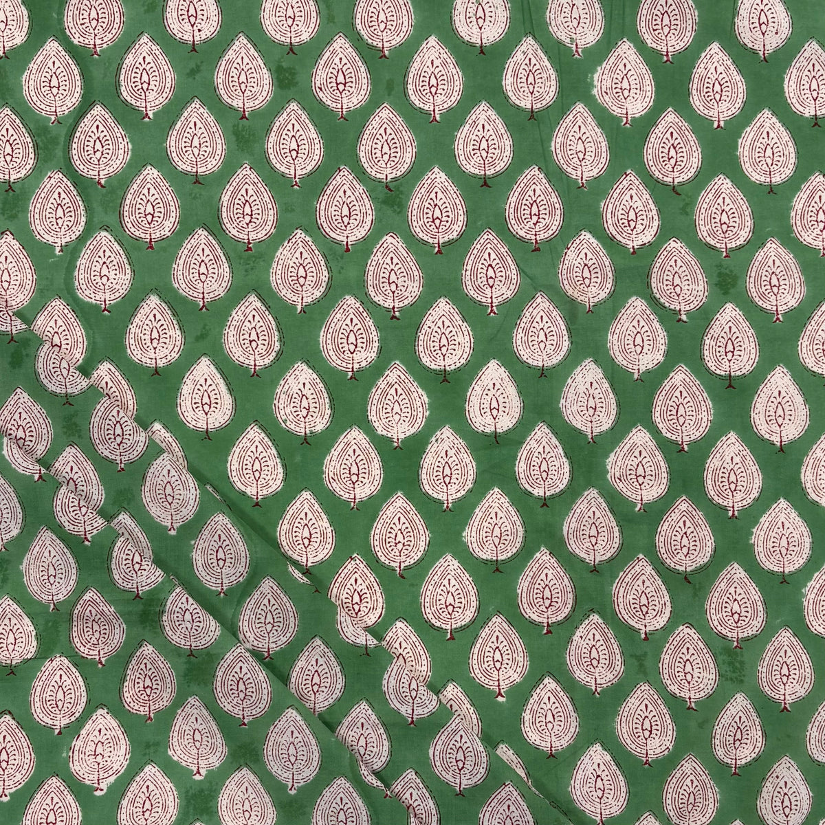 Leaf Motif Block Print Cotton Fabric, folded, lightweight soft cotton with a traditional handcrafted Indian floral pattern
