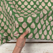 Leaf Motif Block Print Cotton Fabric, with hand for scale, lightweight soft cotton with a traditional handcrafted Indian floral pattern
