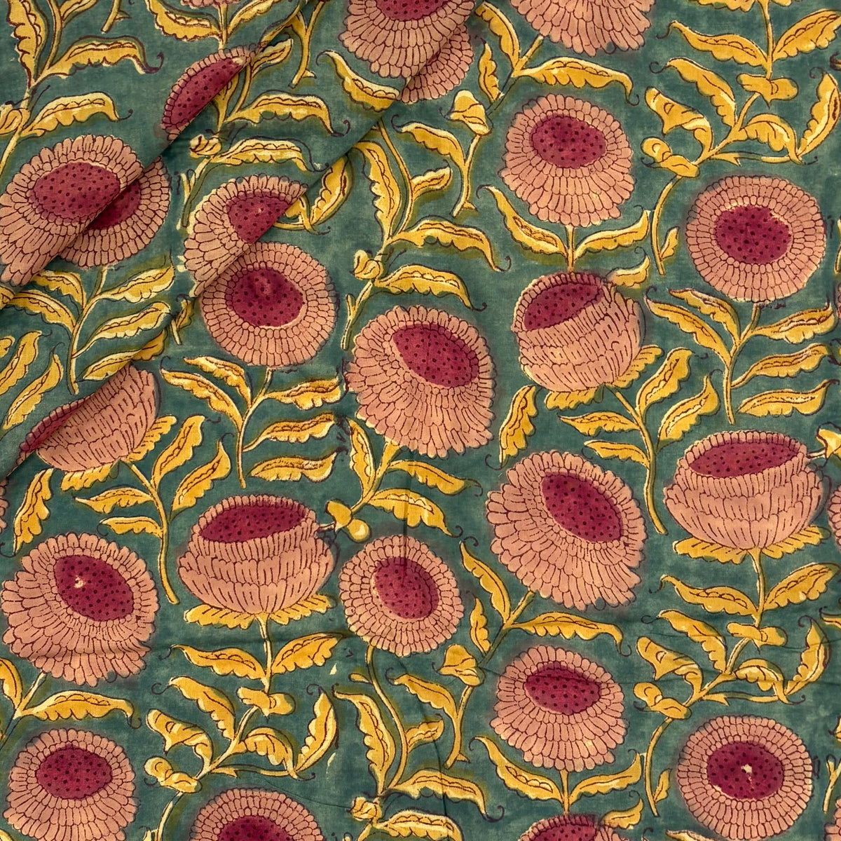 Marigold Floral Block Print Cotton Fabric, folded, lightweight soft cotton with a traditional handcrafted Indian floral pattern