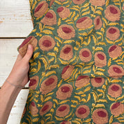 Marigold Floral Block Print Cotton Fabric, with hand for scale, lightweight soft cotton with a traditional handcrafted Indian floral pattern