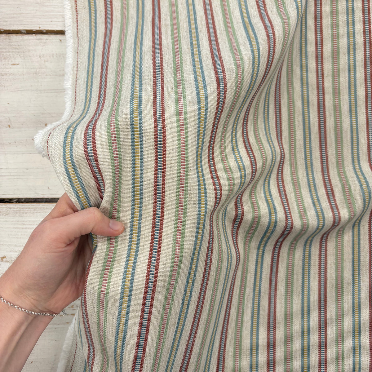 Prestigious Bilberry Summer Fabric With Hand For Scale