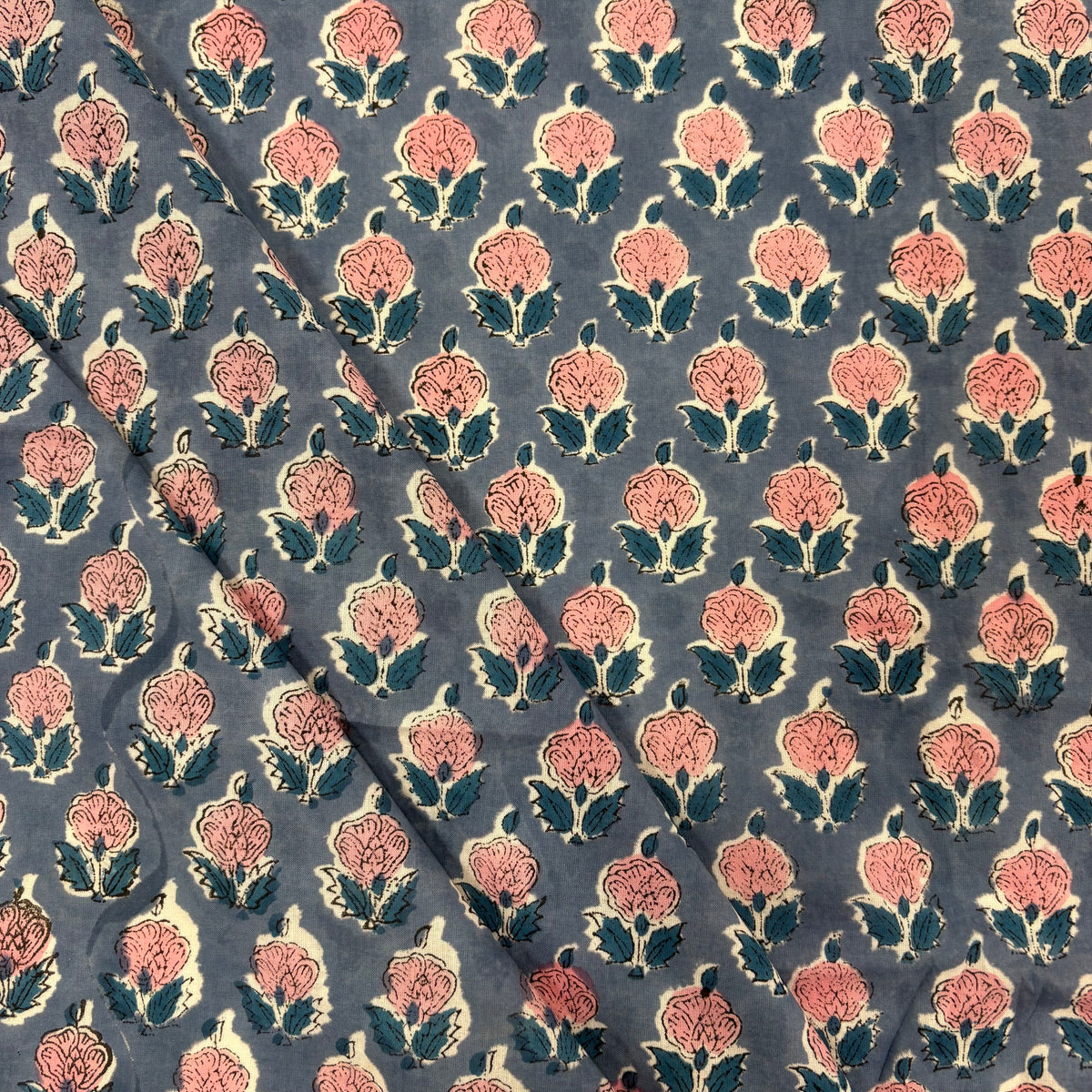 Rose Motif Floral block Print Cotton Fabric, folded, lightweight, soft cotton fabric featuring a traditional handcrafted Indian block print floral pattern, perfect for dressmaking, quilting, crafts, handmade gifts and light home décor projects.