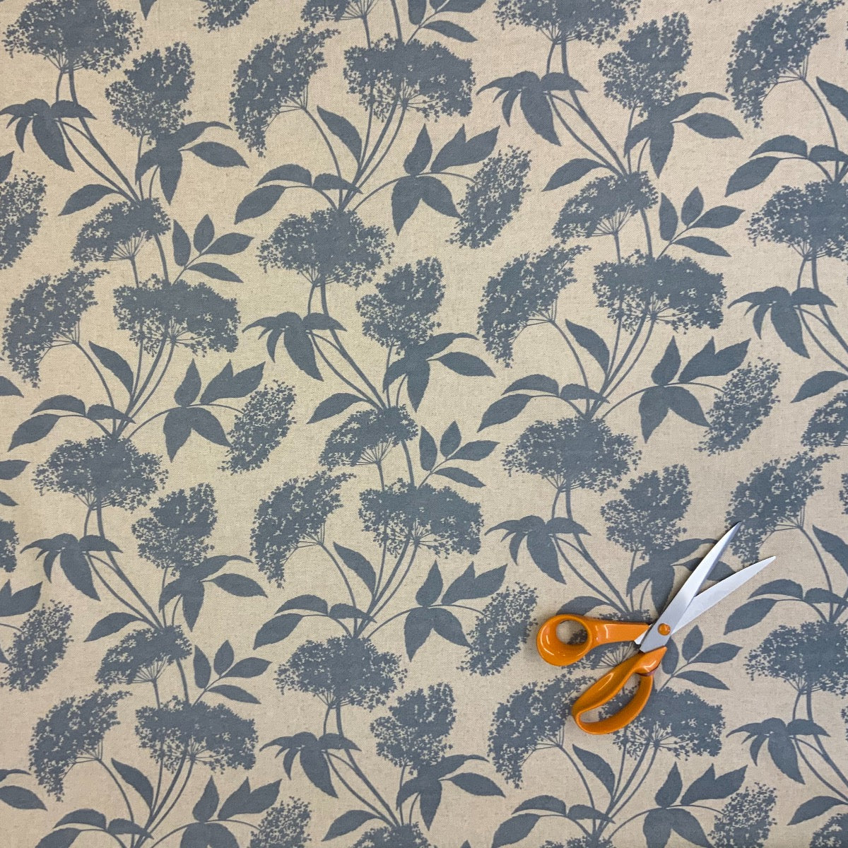 S188 Elderflower Oilcloth Natural Blue Fabric Close Up Fabric Scale