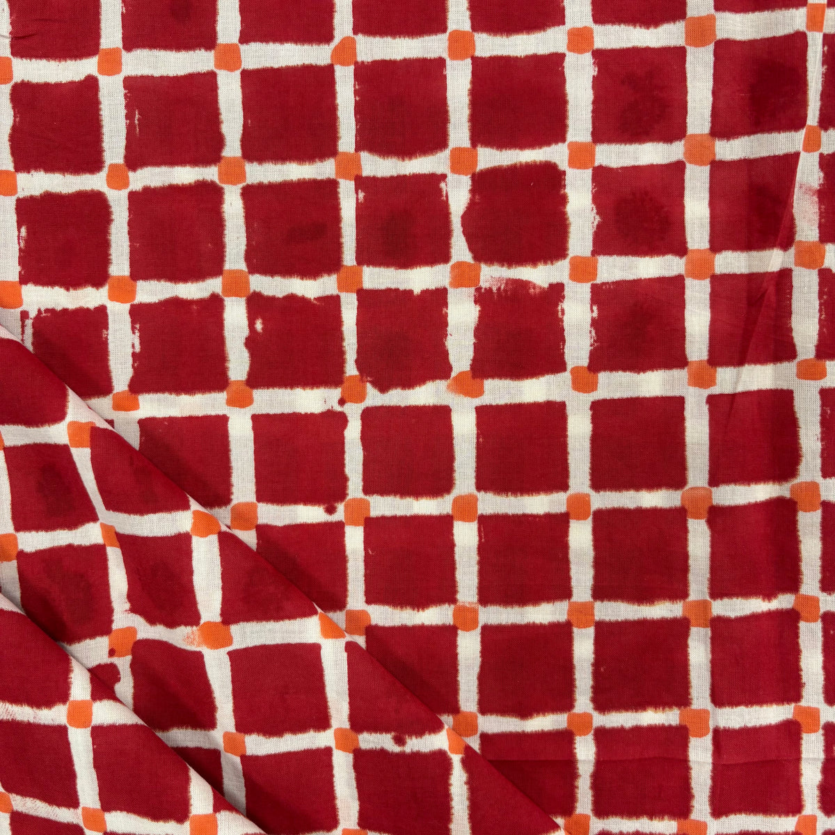 Squares Block Print Cotton Fabric, folded, lightweight soft cotton with a traditional handcrafted Indian tartan check pattern.