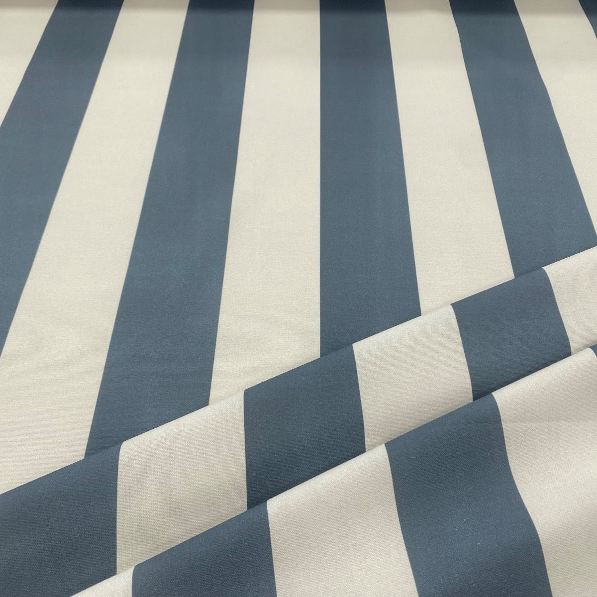 Blue bold cotton stripe fabric folded