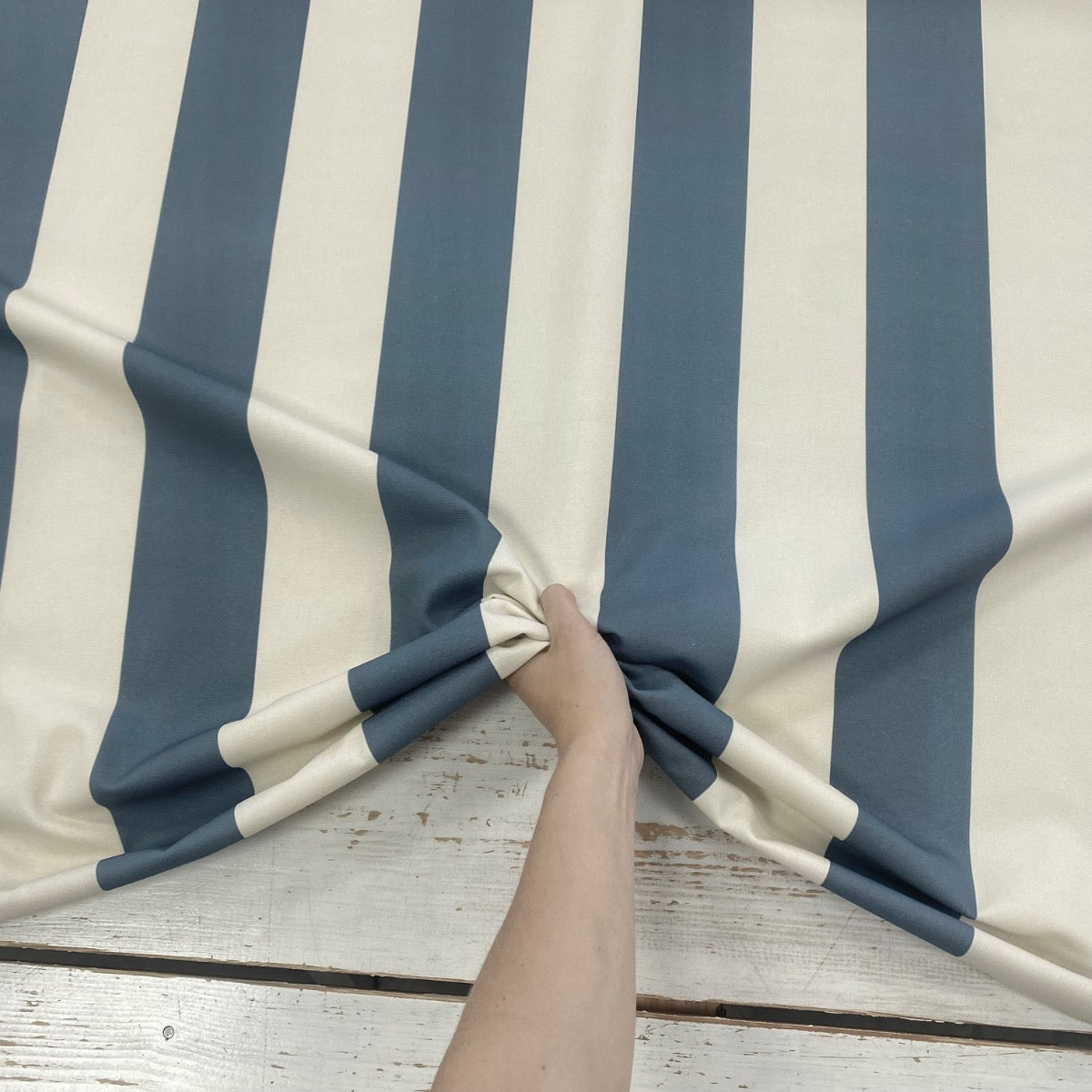 Bold Blue Cotton Stripe With Hand For Scale