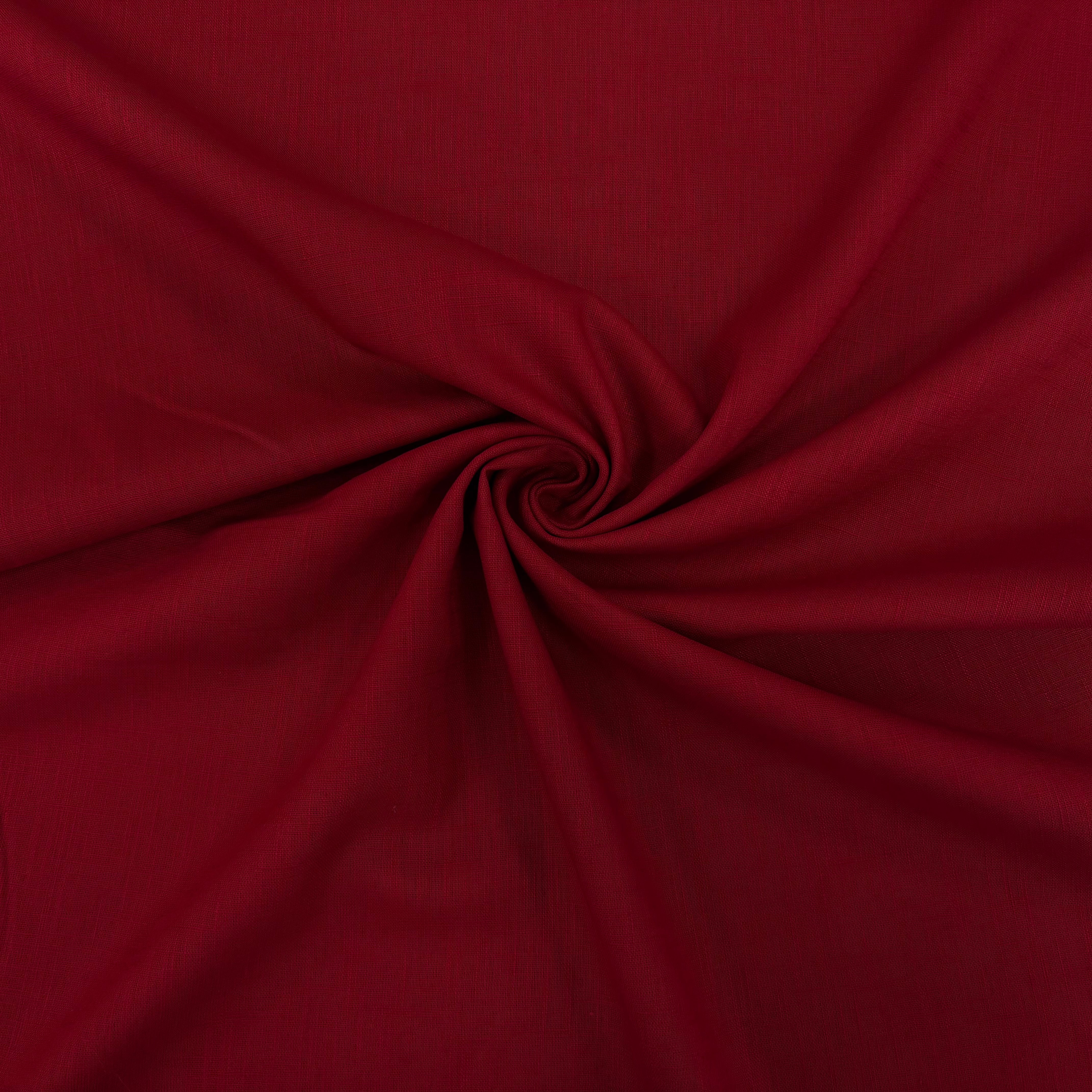 Twisted image of red ramie linen fabric showing its natural weave and textured surface.