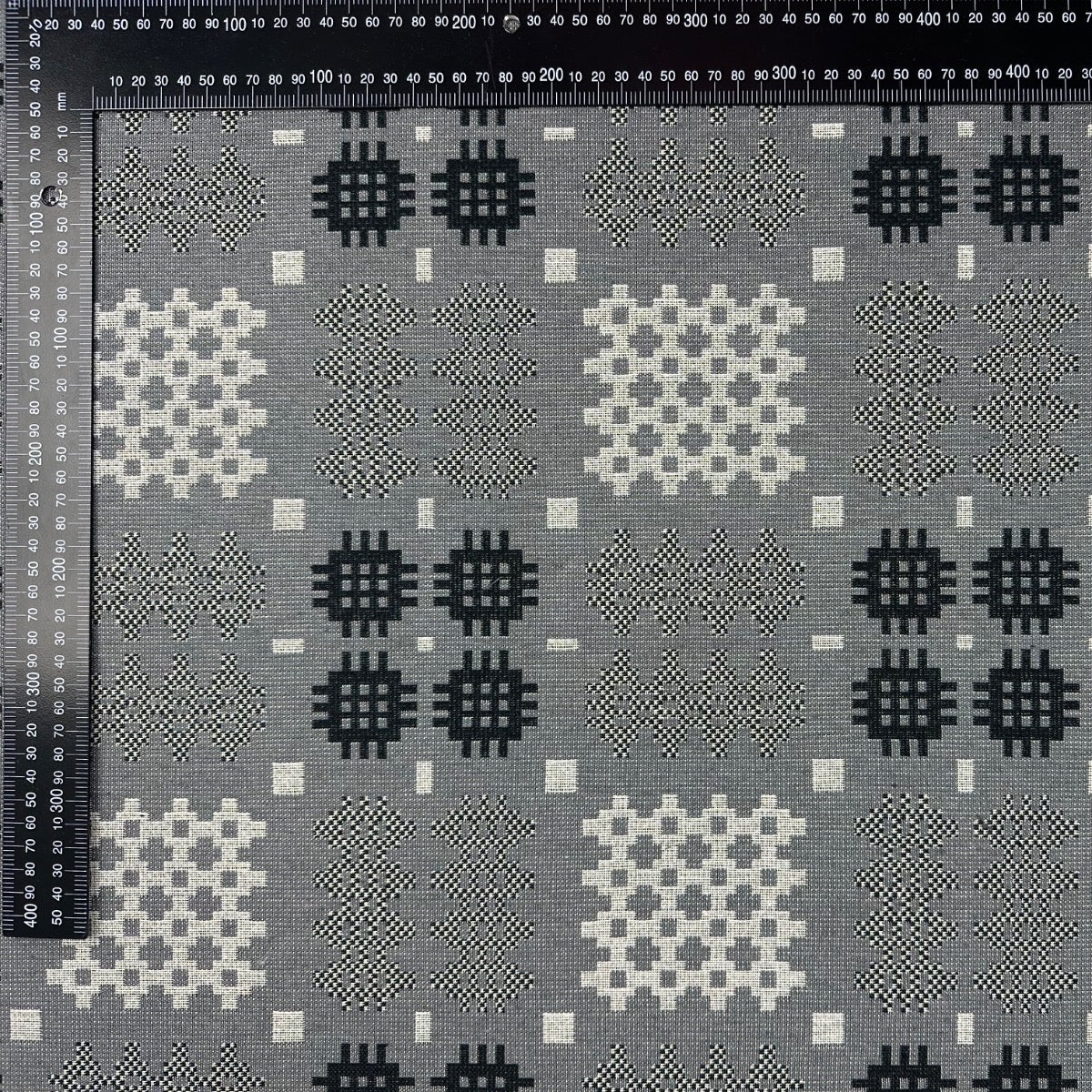 Welsh Blanket tapestry grey fabric with ruler for scale