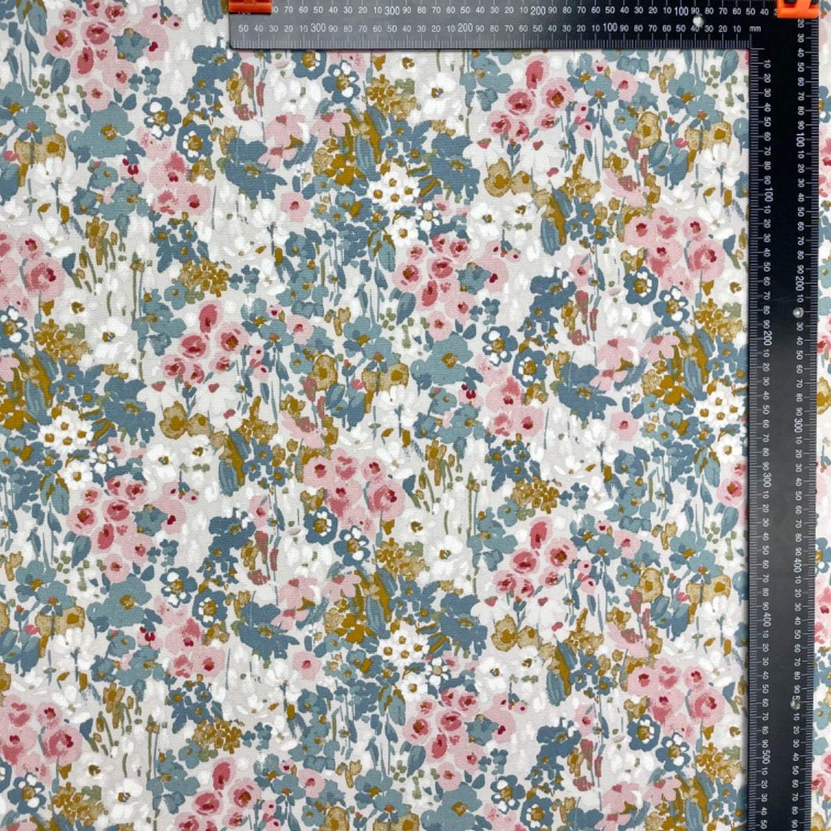 Floral patterned fabric with a ruler for scale