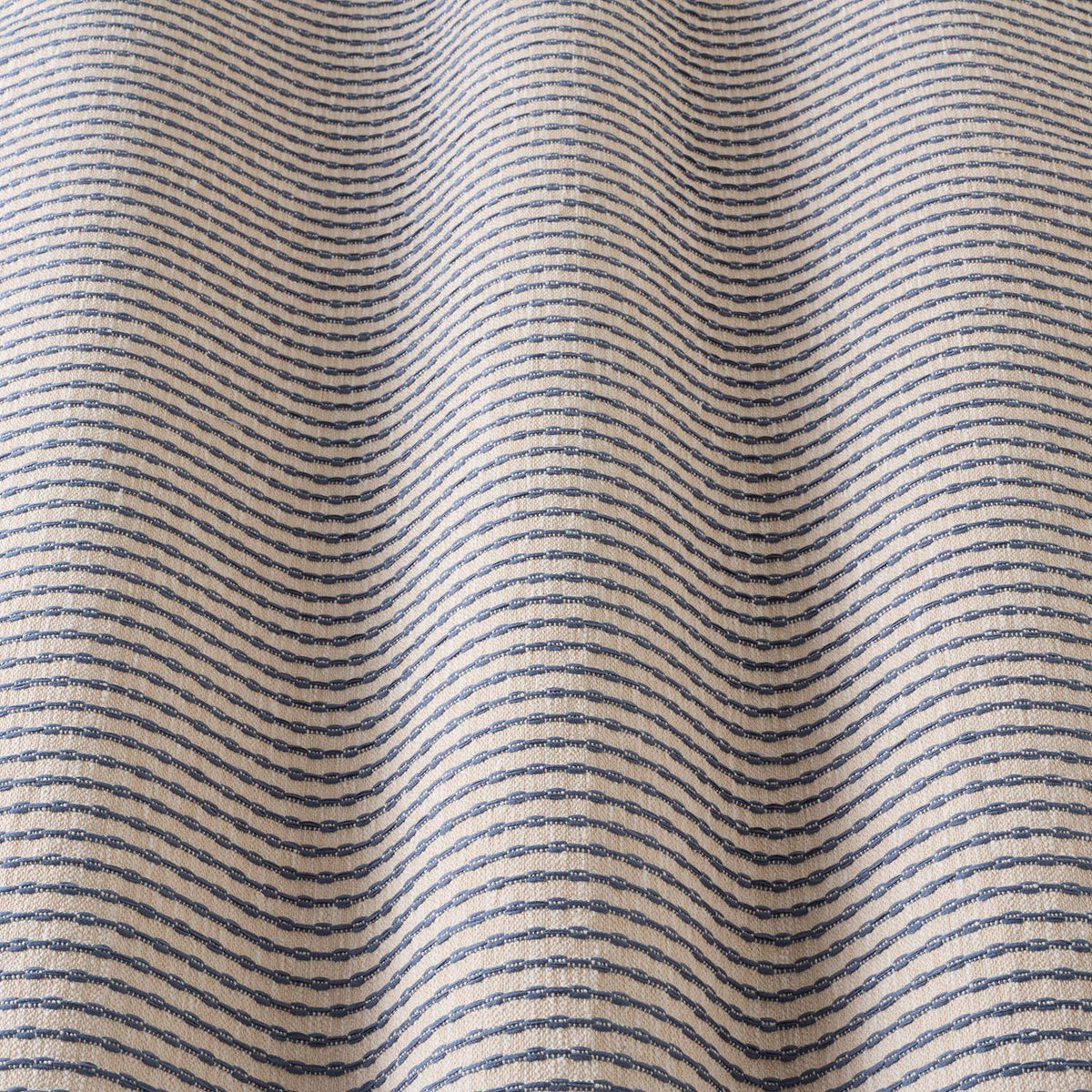 iLiv Sundara Prussian fabric gathered, a contemporary woven stripe cotton-mix upholstery and soft furnishing fabric in rich ochre tones from the Zafira collection