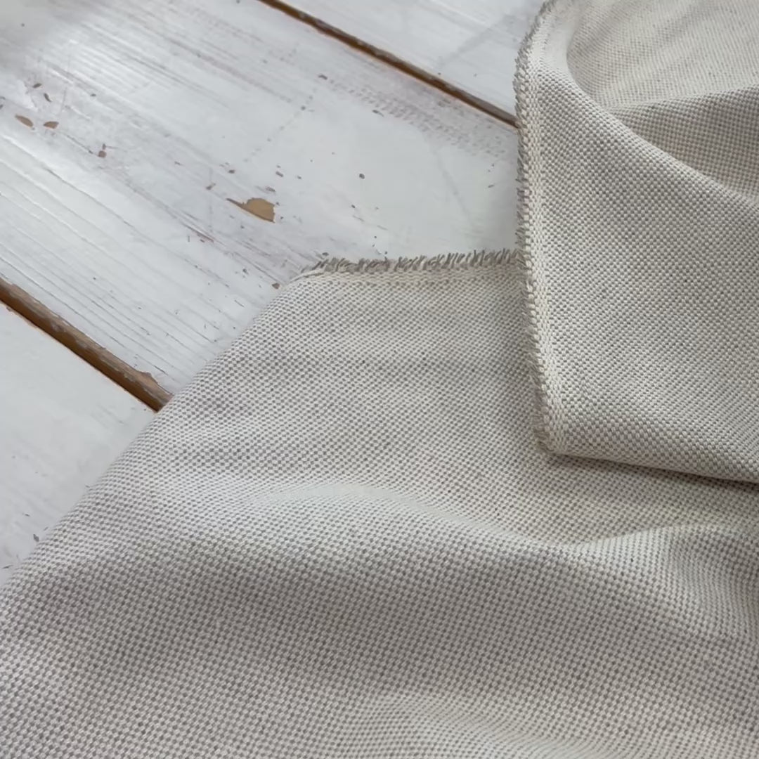 Video of neutral curtain fabric, heavy linen curtain fabric showing texture 